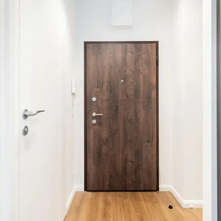 Earthy Elegance Mokotow Apartment *